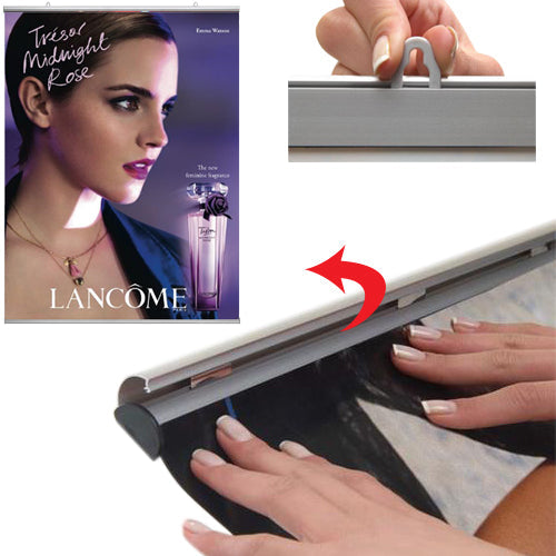 By hand, simply snap open both snap bar rails, top and bottom, slide graphic or poster in, and snap close 